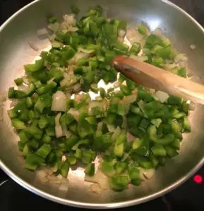 add green capsicum to onion
